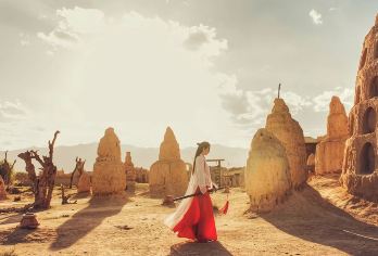 银川出发+西夏王陵+贺兰山岩画+镇北堡影视城包车一日游【银川市区酒店上门免费接送，纯玩轻松包车游，全程不含景区门票，只含车费司机费】