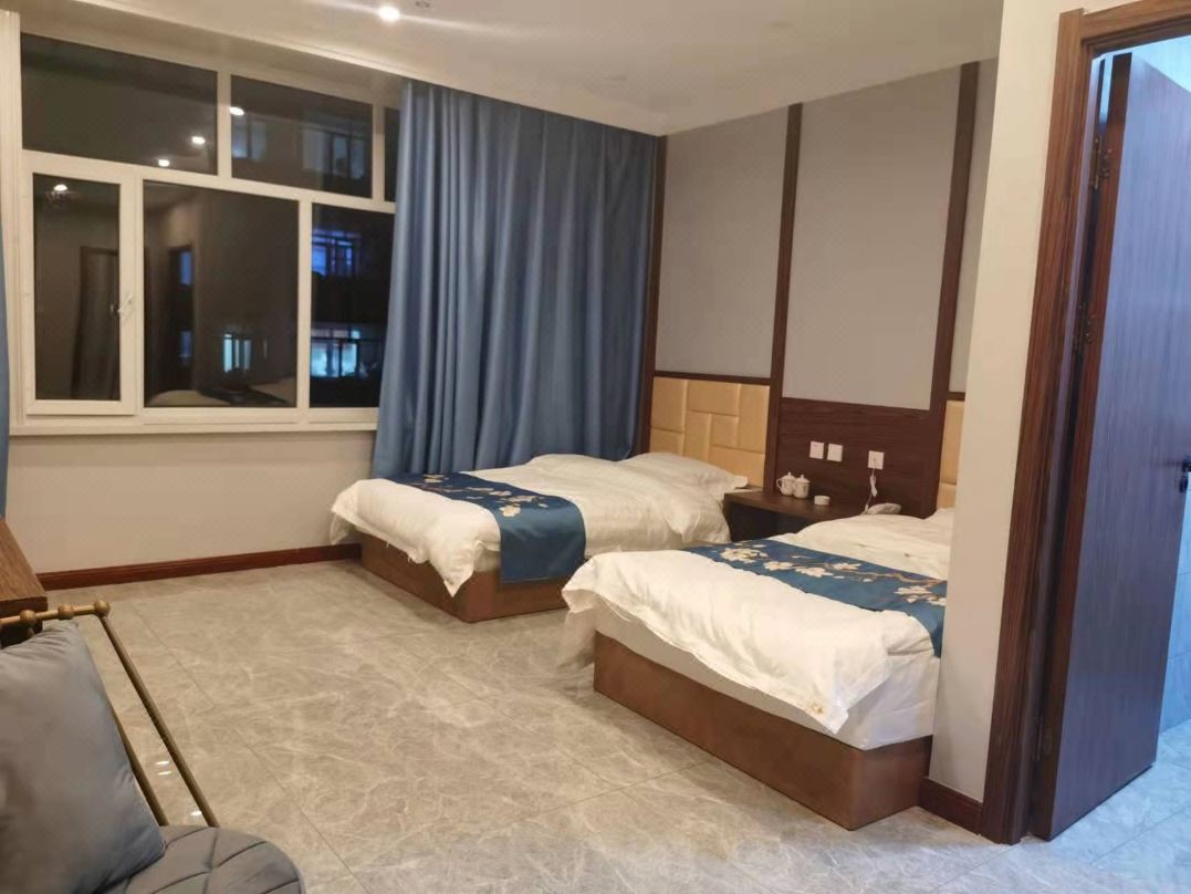 Wangkui Huijin Business Hotel