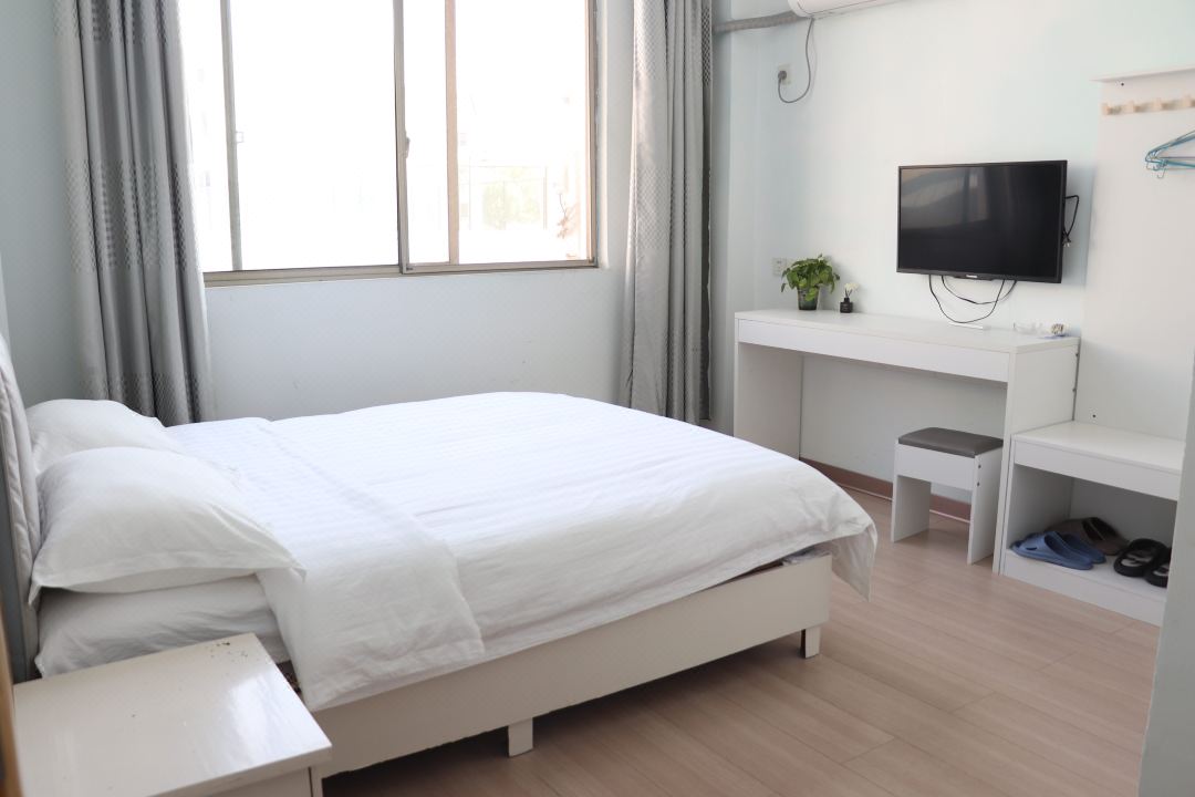 Huaining Shengli Hotel ( Citizen Square Duxiu Park)