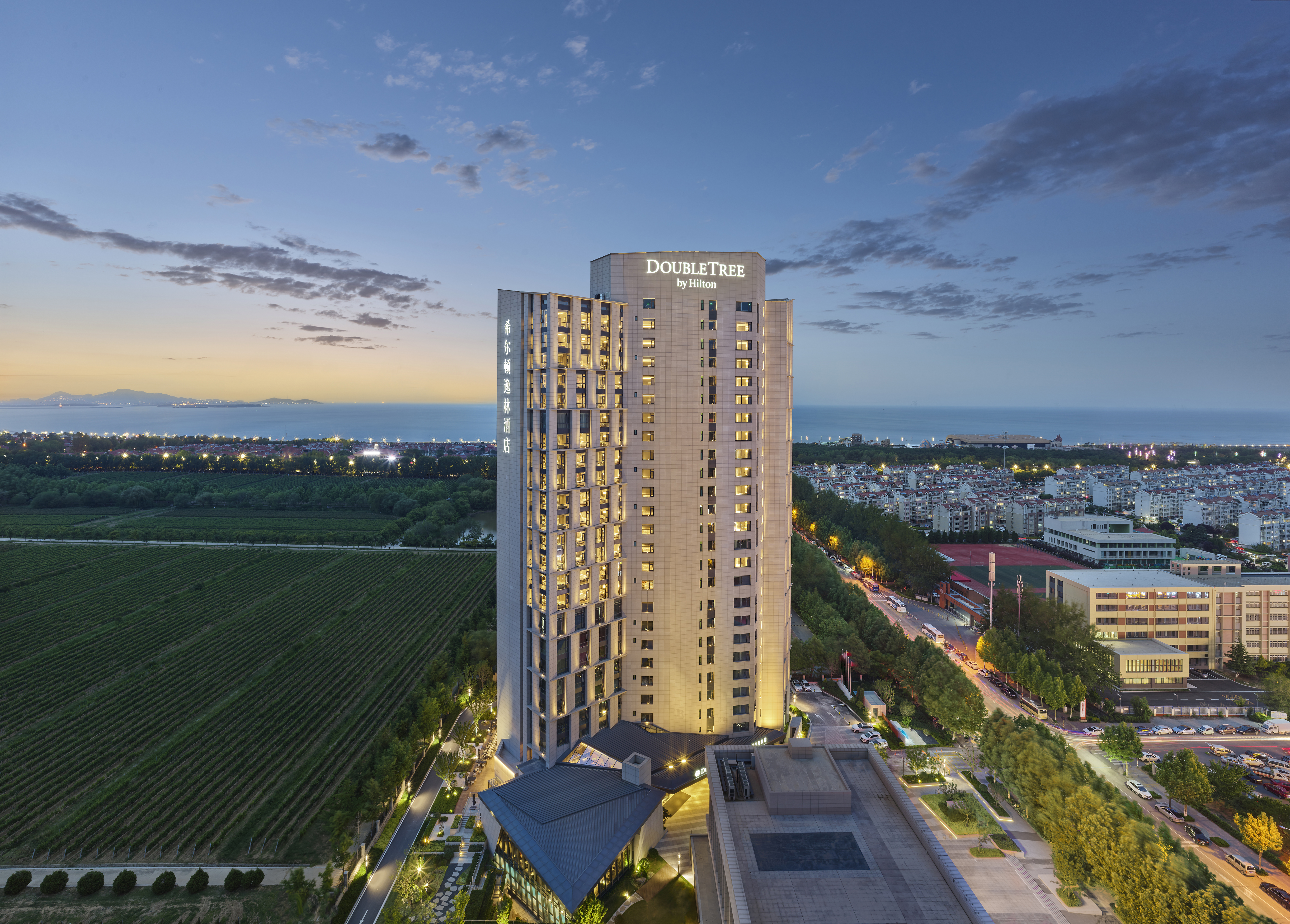 烟台金海岸希尔顿逸林酒店及套房-官方