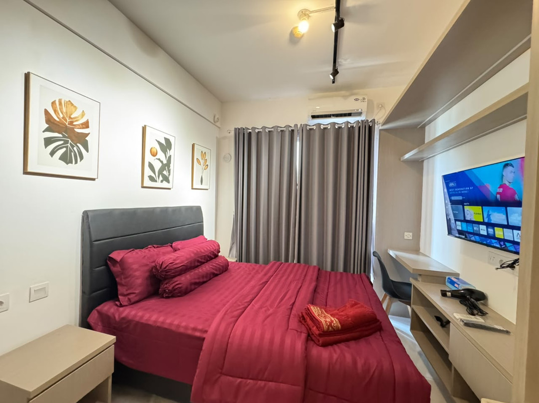 Minimalist Studio at Sky House BSD with Netflix by Betah Banget