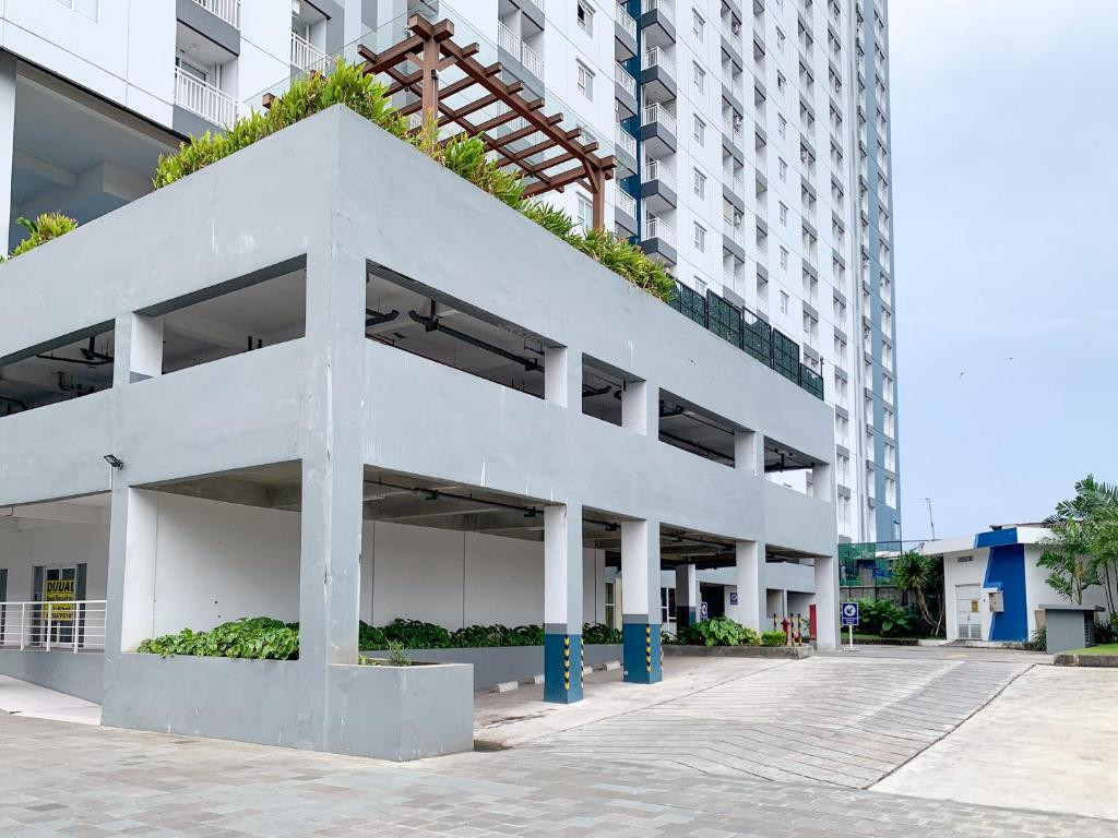 Urbanview Hotel @ Suncity Residence Apartemen Sidoarjo