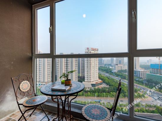 烟台绿色假日狂想曲公寓