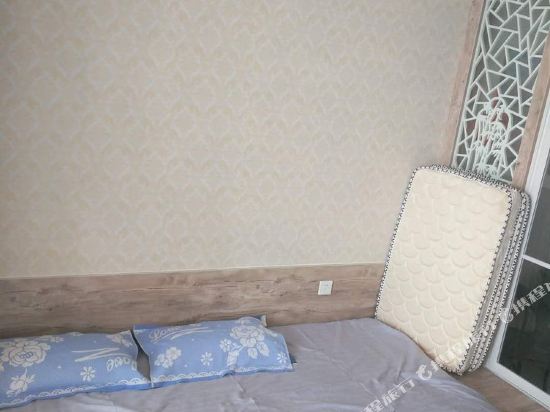 荣成王石磊公寓