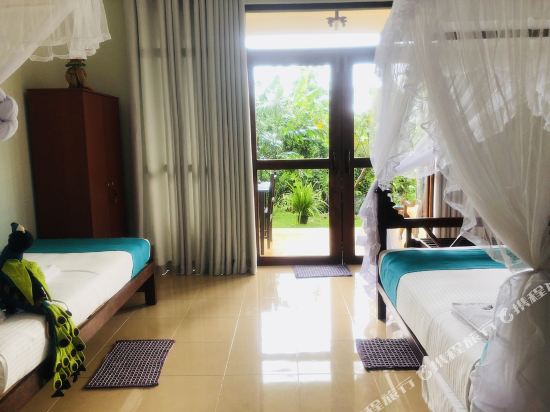 Peacock Villa Room Type - Deluxe Triple Room Peacock Villa Room Type - Deluxe Triple Room