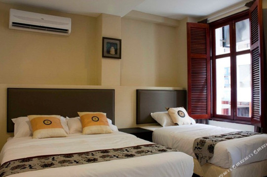 士毛月苏活酒店