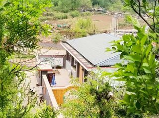 北京密云雾灵山丽林山民宿，矗立于乡野山林之中，原生态乡村情怀