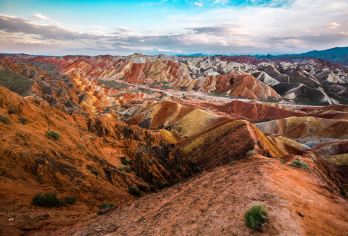 张掖七彩丹霞+平山湖大峡谷一日游丨定点上下车看日落穿越峡谷【免费送张掖站，正规旅游大巴，带领队】
