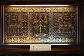 刻印在墙上的黎族画像