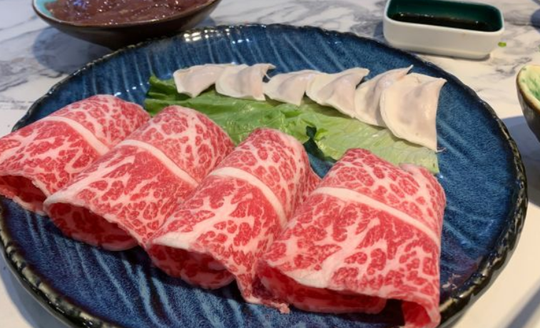 甄蚌海鲜肥牛火锅