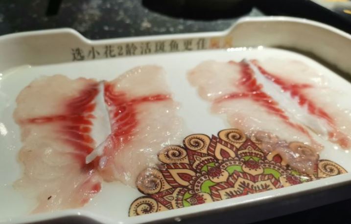 老牌坊云南鱼豆花火锅(哈西金爵店)