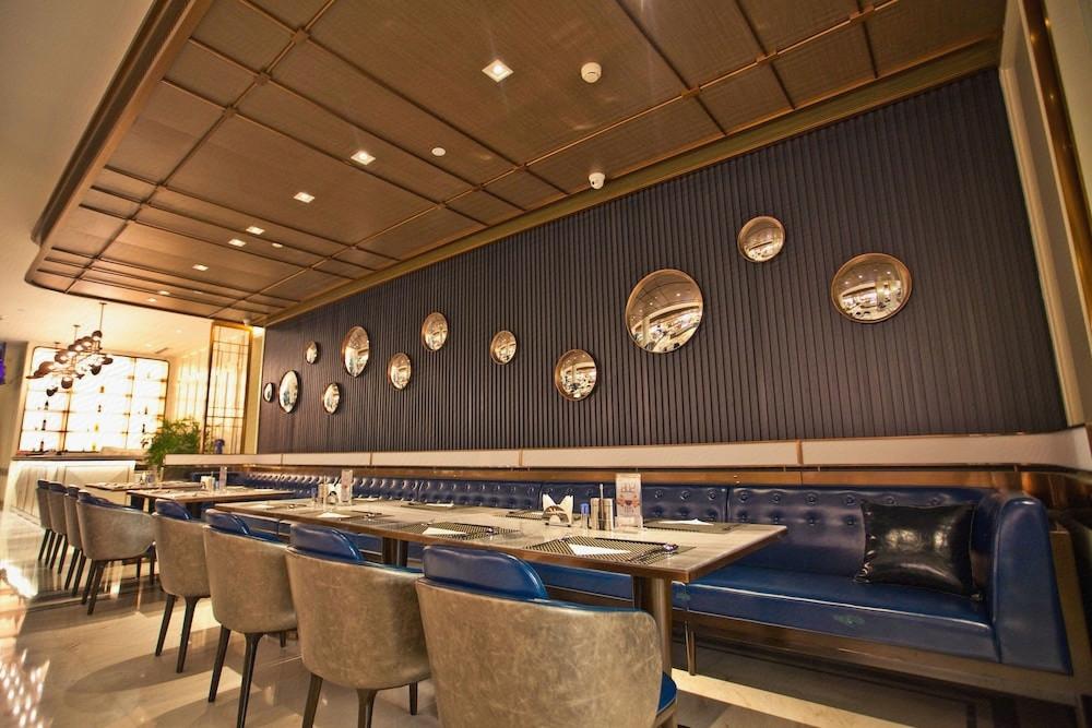 青岛鑫江温德姆酒店·水青咖啡苑餐厅图片