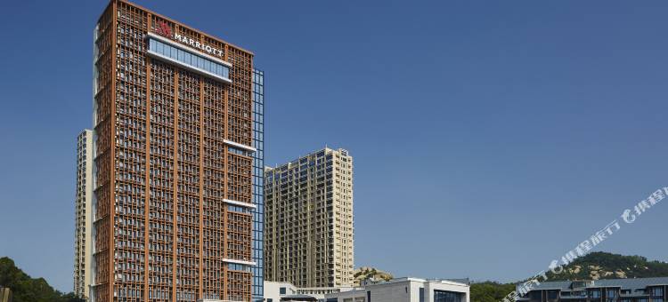 新骏景酒店(吉大海滨公园情侣路店)图片