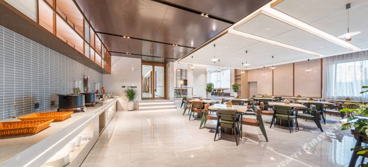 白玉兰酒店(塔城地区乌苏火车站九莲泉公园店)图片