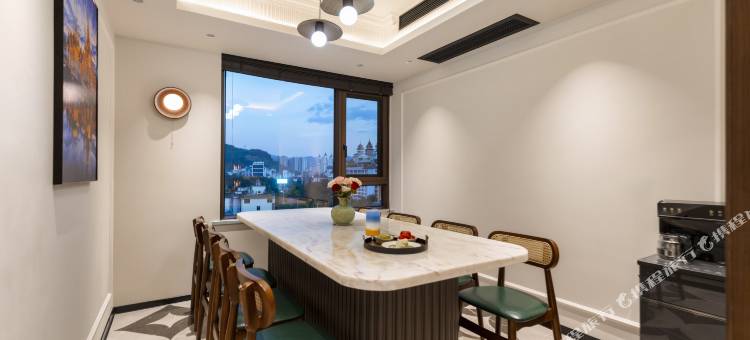 烟雨居影院度假民宿(西双版纳景洪告庄西双景星光夜市店)图片