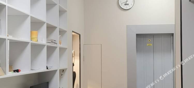 江畔酒店(资源中心花园广场风雨桥店)图片