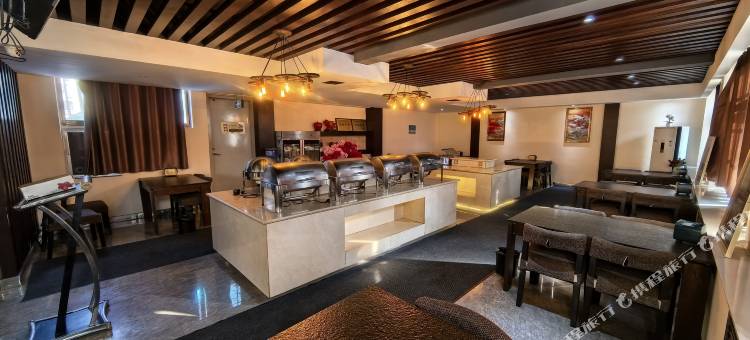 曼卡金苹果酒店(费县东方购物广场店)图片