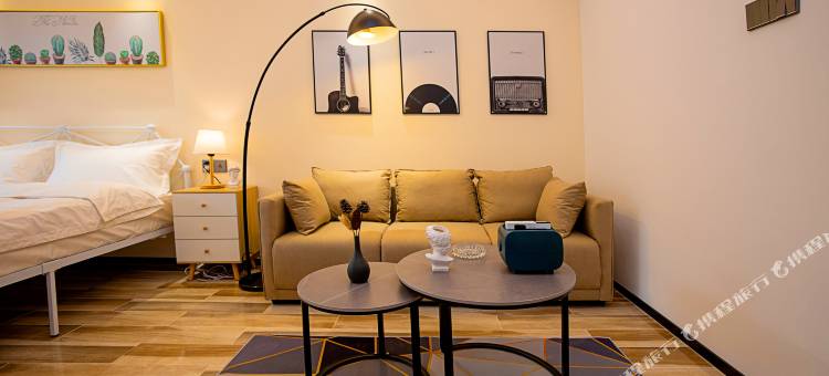 寓美乐居酒店(郑州二七万达正商寓见铭筑店)图片
