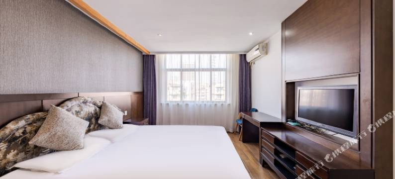 万居商务酒店(吴淞口国际邮轮码头第九人民医院店)图片