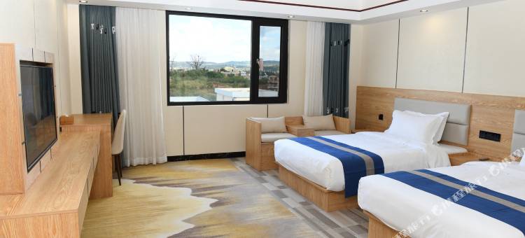 UP酒店(石林万城阿诗玛小镇驾考中心店)图片