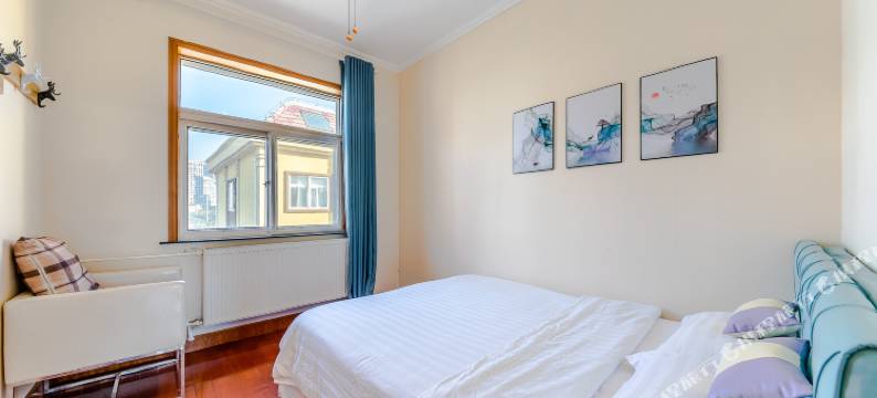 玺乐民宿(青岛国信体育场店)图片