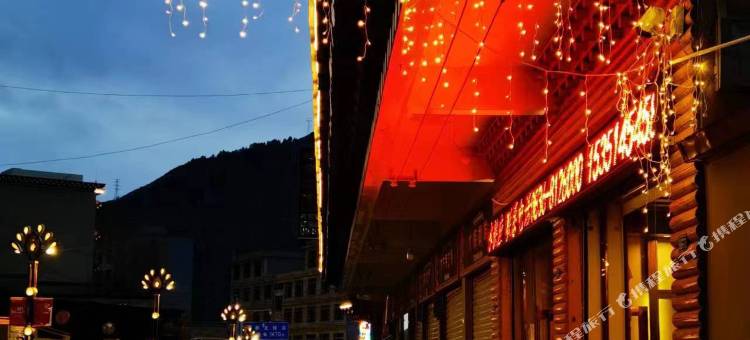 新龙梁昂孜荣大酒店图片