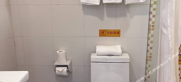 东港斯丽酒店(黄海大市场店)图片