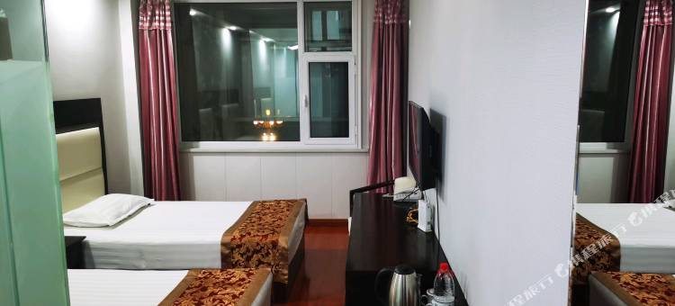 河曲鸣三省商务酒店图片