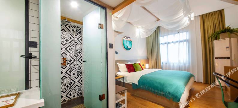 由里美居·智慧酒店(都江堰风景区南桥步行街店)图片