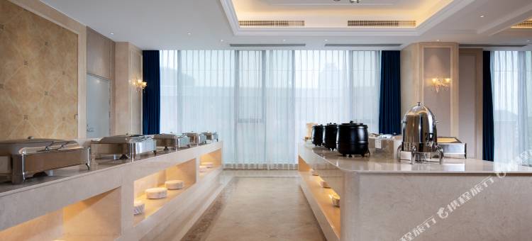 维也纳国际酒店(绿地东海岸可乐村地铁站店)图片