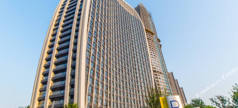 暖阳精品公寓(青岛城市阳台欢乐海湾店)图片