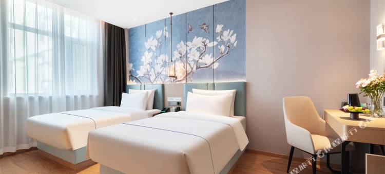 白玉兰酒店(泰安新泰青云购物中心金斗路店)图片