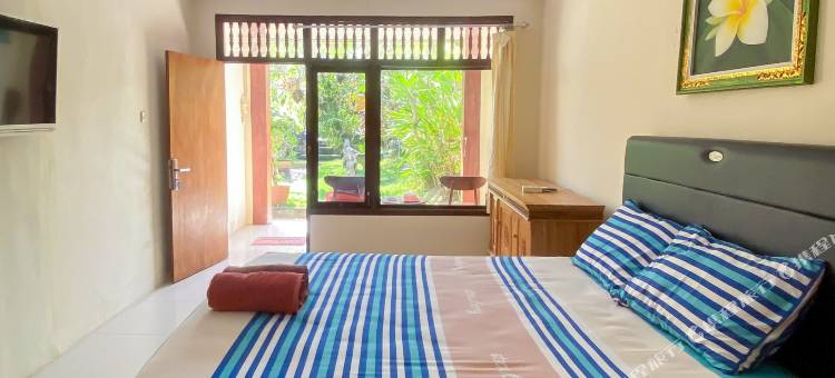 拉贾阿斯里格斯特豪斯萨努尔米特拉瑞德多兹(Raja Asri Guest House Sanur Mitra RedDoorz)图片
