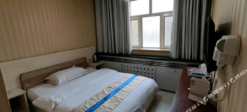 新粮宾馆(乌鲁木齐国际机场店)图片