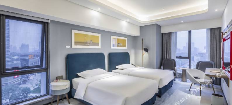 新乡艺悦酒店(宝龙城市广场胖东来三胖店)图片