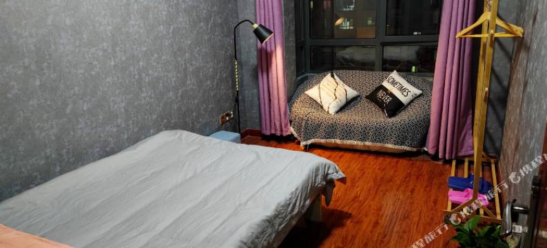 东篱青年旅舍(信阳火车站天润广场店)图片