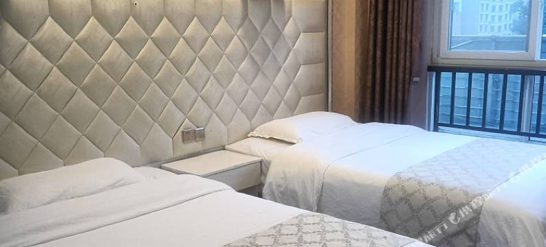 茂县萬贤居商务酒店图片