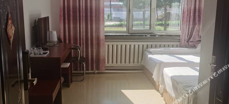 根河市满归镇暖冬宾馆图片