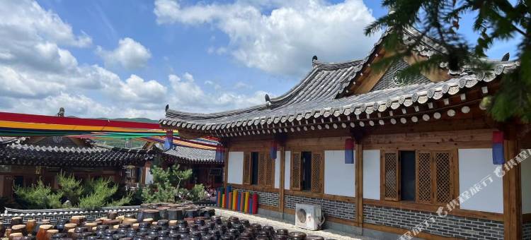 延吉市旅怡暖居民俗民宿(恐龙王国店)图片