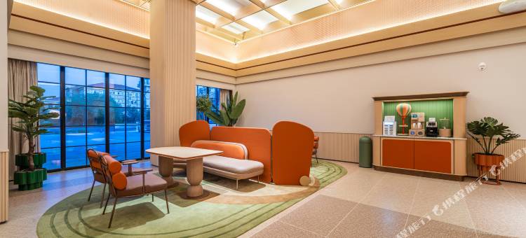 桔子酒店(博乐开屏湖公园店)图片