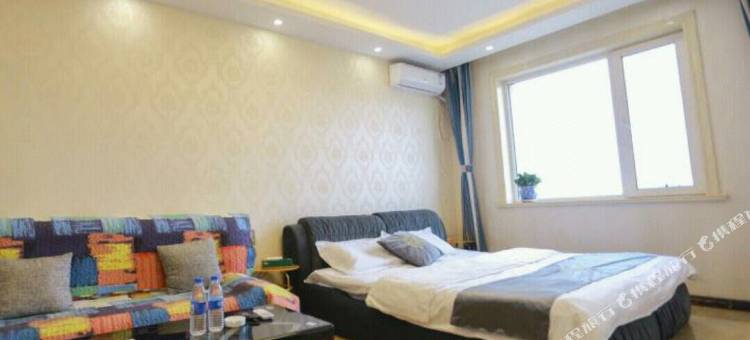 轻住酒店·果然精品(乐松机场巴士凯旋广场店)图片