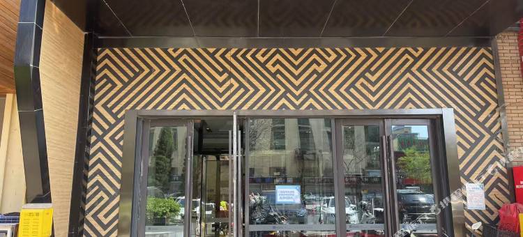 逸居民宿(开发区万达广场店)图片