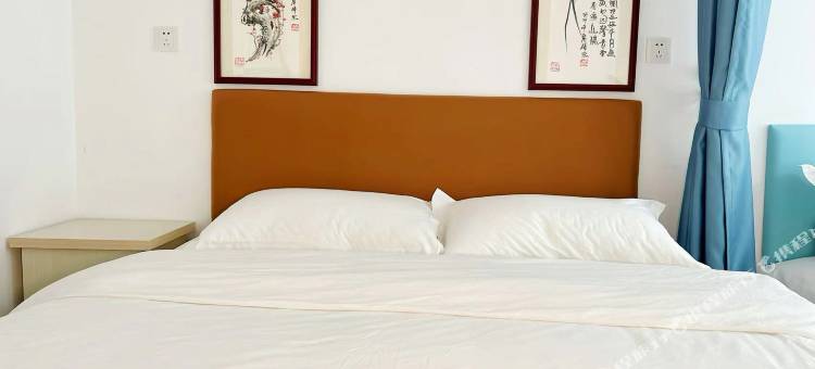 百岁鱼海景loft民宿(养马岛度假区店)图片