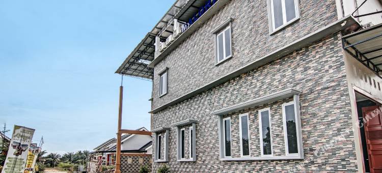 OYO 92081 马洛拉家庭旅馆(RedDoorz Near Parit Indah Pekanbaru)图片