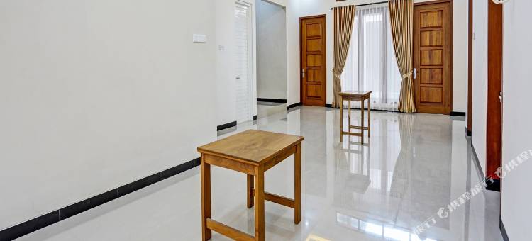 OYO 92209 康戈里科家庭民宿(Kanggo Riko Family Homestay Mitra Reddoorz)图片