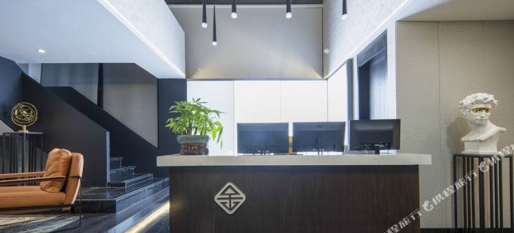 原舍酒店(金堂华地财富广场店)图片