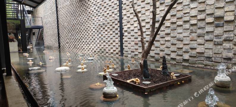 苏州起点假日宾馆(本色美术馆尹中路地铁站店)图片