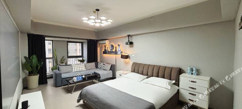 M设计师观影民宿(银川金凤万达广场店)图片