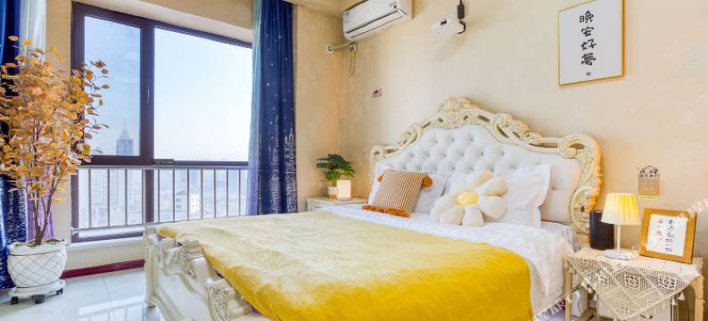 Mila棉花堂设计师民宿(万熹城市广场店)图片