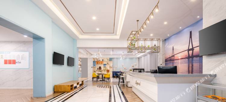 白玉兰酒店(琼海万泉河环球春天广场店)图片